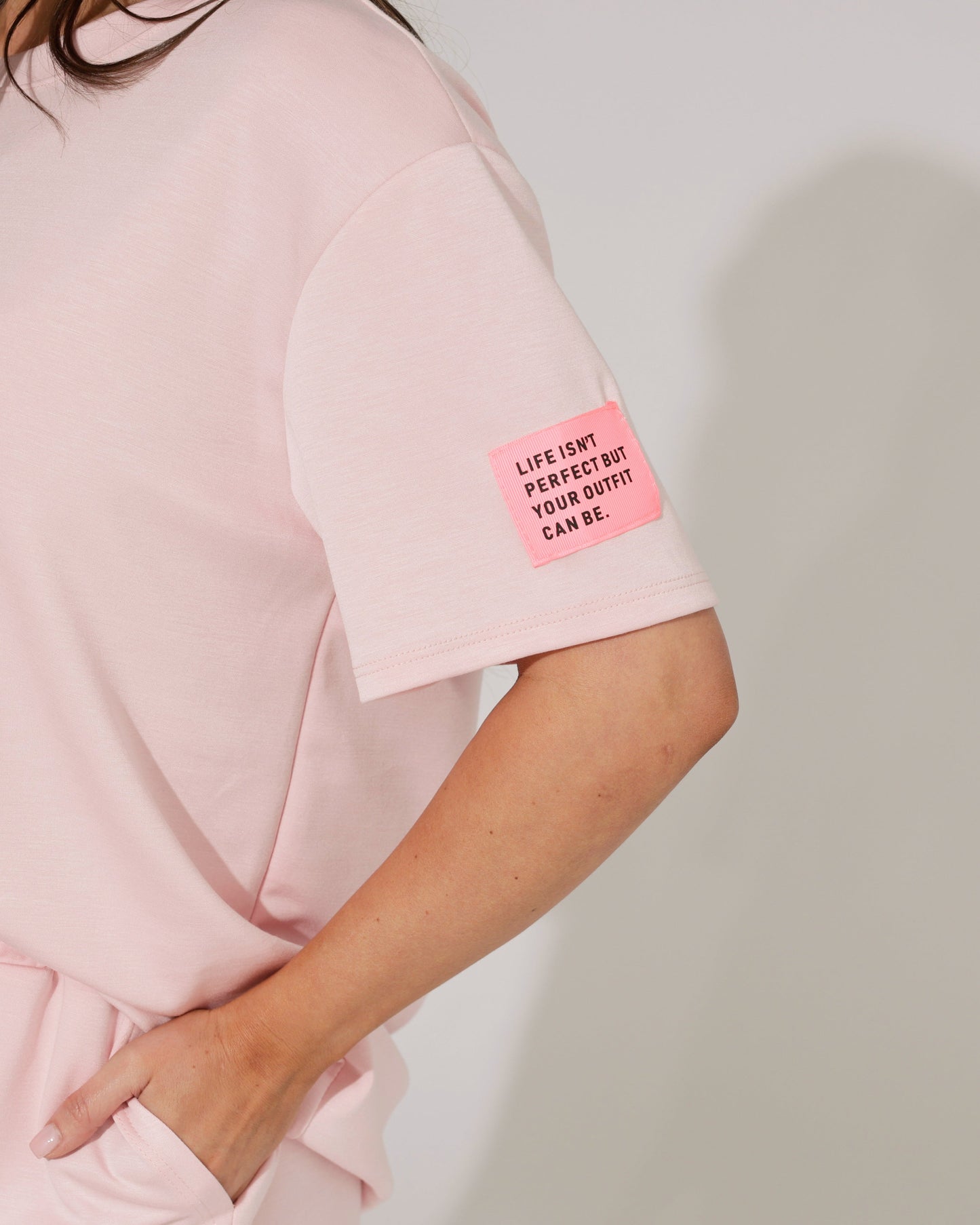 Rear view of the elegant Evora soft pink co-ord set, highlighting the design details on the back.