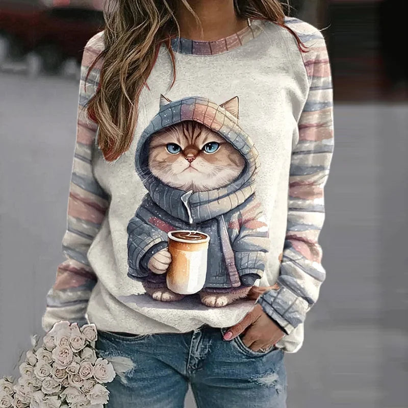 Detailed close-up of the charming cat print on the Fiona sweatshirt, highlighting the soft fabric texture.