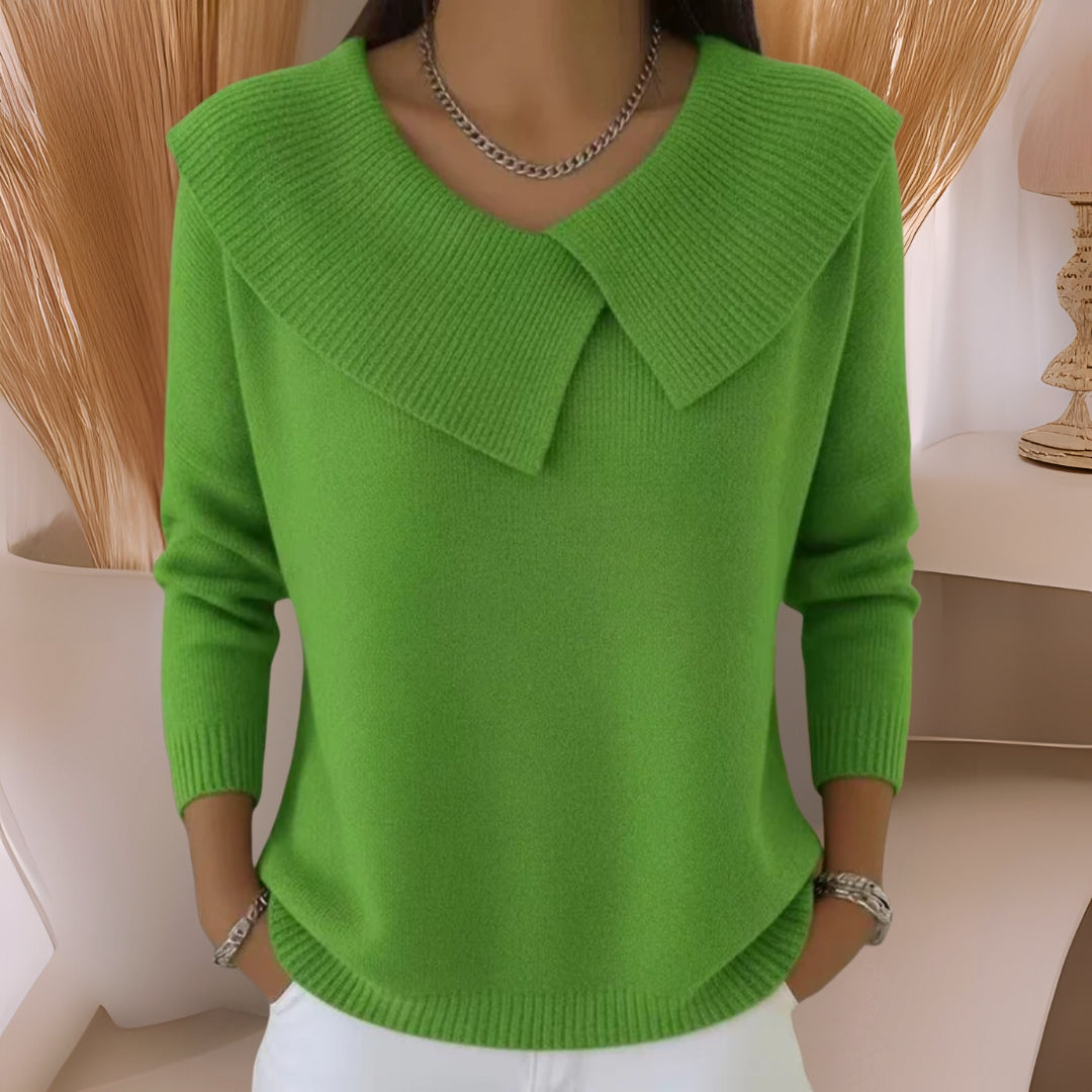 Rear view of a light green knitted soft collar sweater, emphasising the relaxed fit and comfortable silhouette.