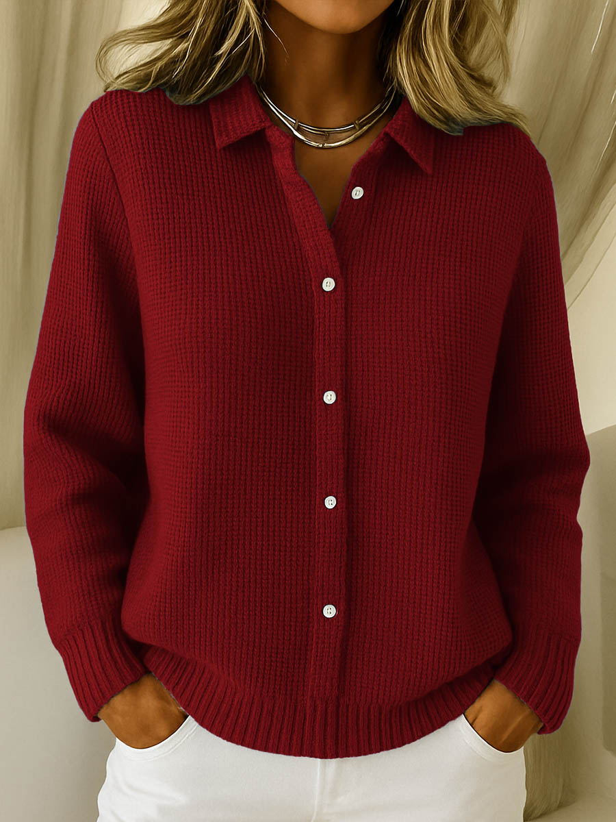 Lifestyle shot of a red Peridot women's collared jumper, styled casually with jeans, focusing on its versatile appeal.