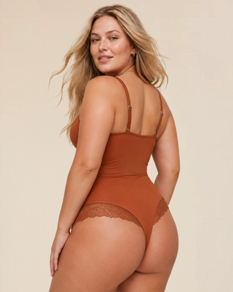 Flat lay of the black Rhea versatile half-laced bodysuit, displaying fabric texture and full design details.