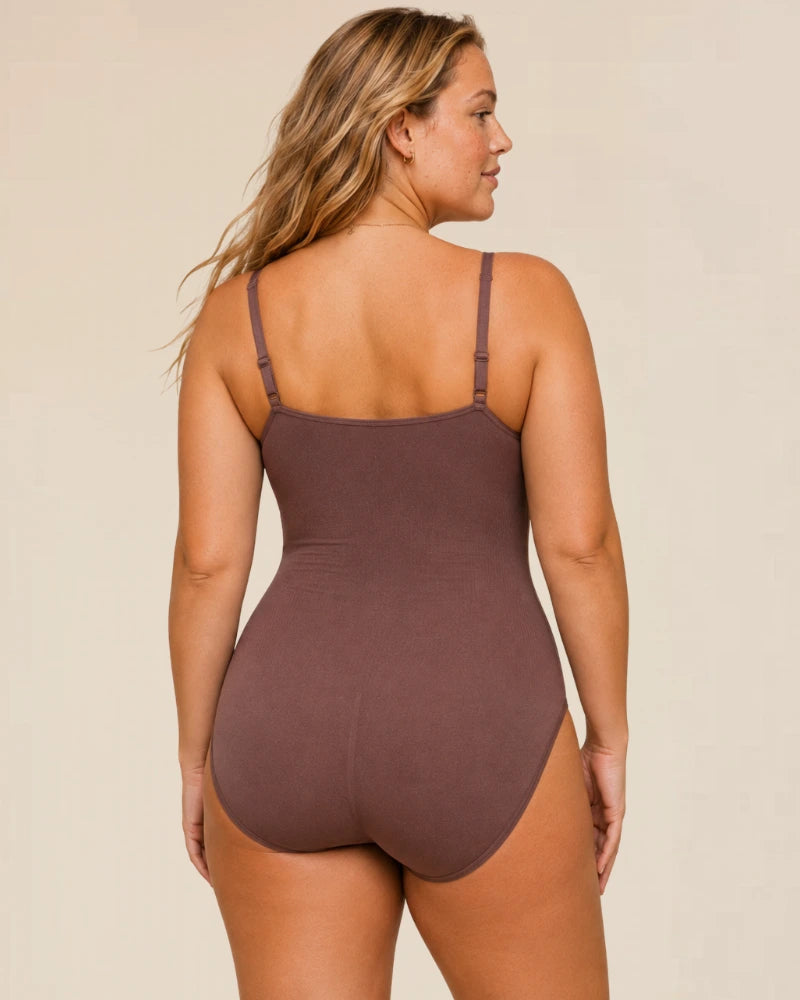 Dynamic shot of the navy Zephyra sculpting body shaper in motion, demonstrating flexibility and comfort.