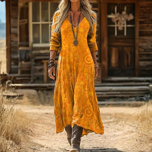 Front view of the Adeline vintage-inspired long sleeve casual dress in a yellow floral print, styled neutrally.