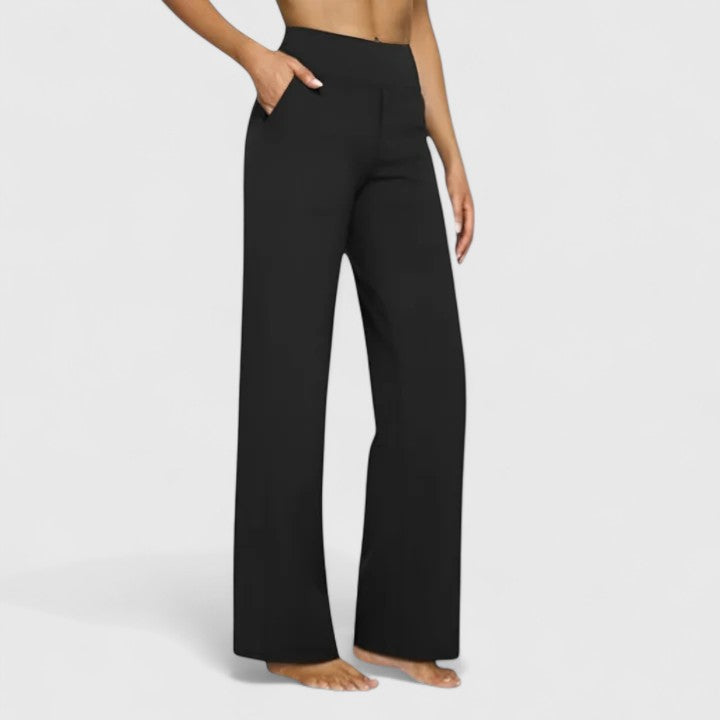Close-up of the wide elasticated waistband on black Adeline pull-on trousers, demonstrating comfort.