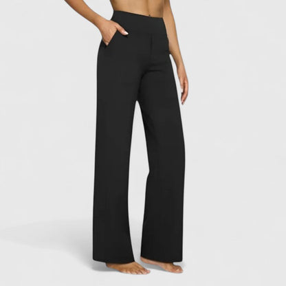 Close-up of the wide elasticated waistband on black Adeline pull-on trousers, demonstrating comfort.