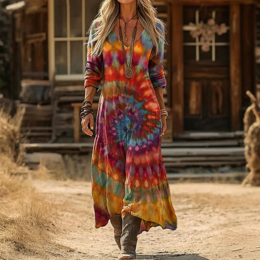 Front view of a woman wearing the multicolor Adira vintage long sleeve dress, showcasing its relaxed fit and calf-length design.