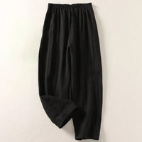 Detailed view of the functional side pocket on the Adira cotton-linen trousers.
