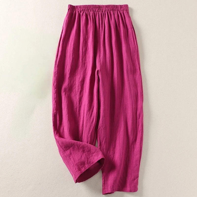 Flat lay of the Adira flowy trousers, displaying the pull-on design and fabric quality.