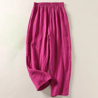 Flat lay of the Adira flowy trousers, displaying the pull-on design and fabric quality.