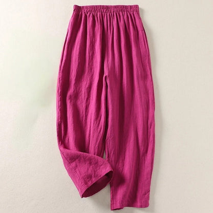 Flat lay of the Adira flowy trousers, displaying the pull-on design and fabric quality.