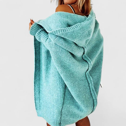 Front view of a women's Aella hooded open-front cardigan in a blue-green shade, showcasing its relaxed fit and textured knit.