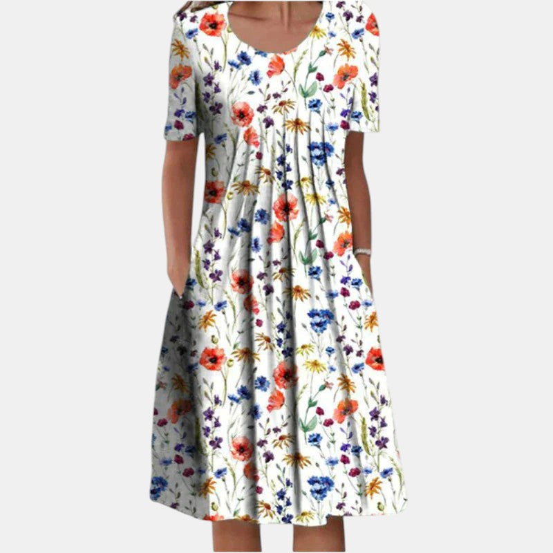 Front view of the Alessia cotton tummy control dress in a vibrant red floral pattern, showcasing the relaxed fit.