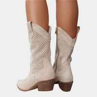 Detail shot of the heel and sole of the orthopaedic cowboy boots, emphasizing the stable moderate heel and durable construction.