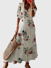 Anthea boho vintage summer dress styled with sandals and a sun hat, ideal for a beach holiday.