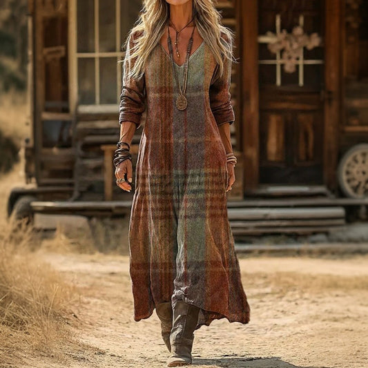 Front view of a woman wearing the Antonia vintage long sleeve casual dress, showcasing the V-neck and calf-length fit.