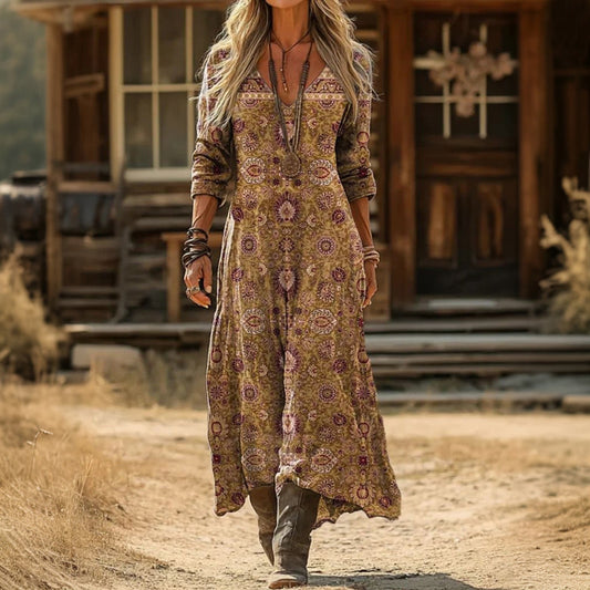 Front view of a woman wearing the multicolored Antonia vintage long sleeve dress, showcasing its relaxed fit and elegant V-neck.