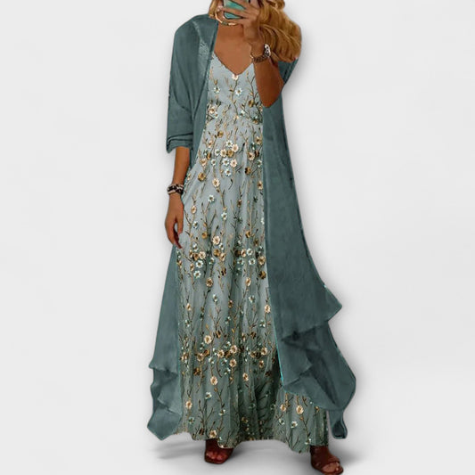 Front view of a woman wearing the blue Antonia elegant tummy coverage set, standing confidently with a relaxed posture.