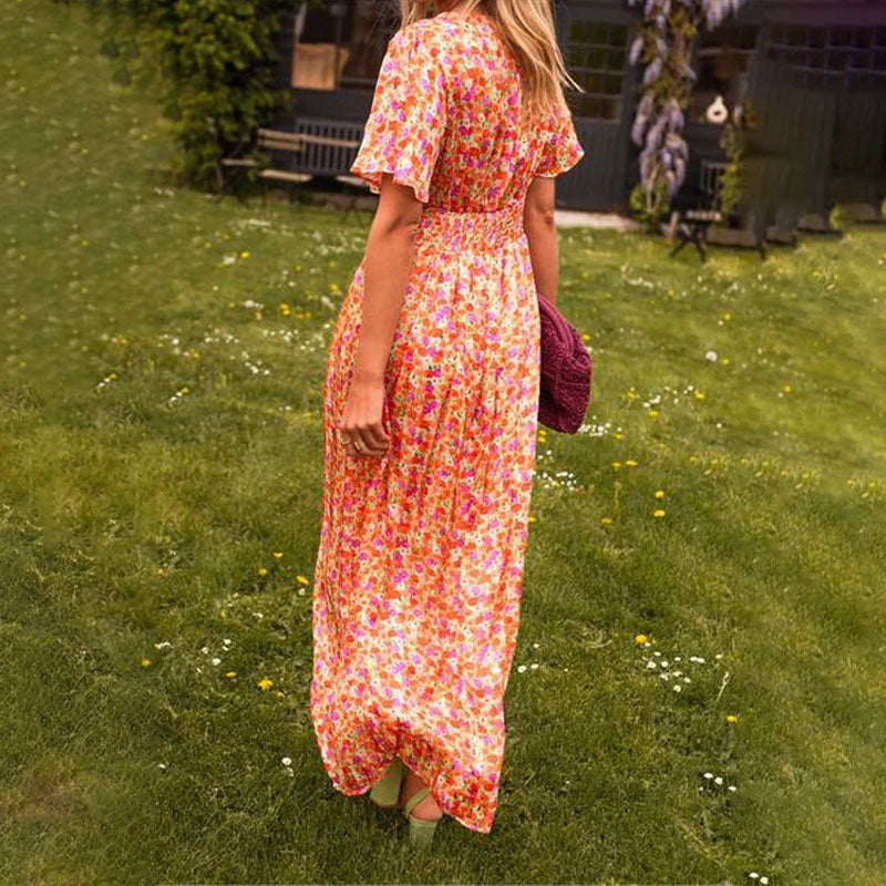 Lifestyle shot of the red Antonia A-Line Dress, styled for a daytime casual event, with accessories.
