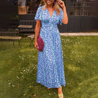 Full-length view of the blue Antonia A-Line Dress on a mannequin, emphasizing its midi-length and elegant drape.
