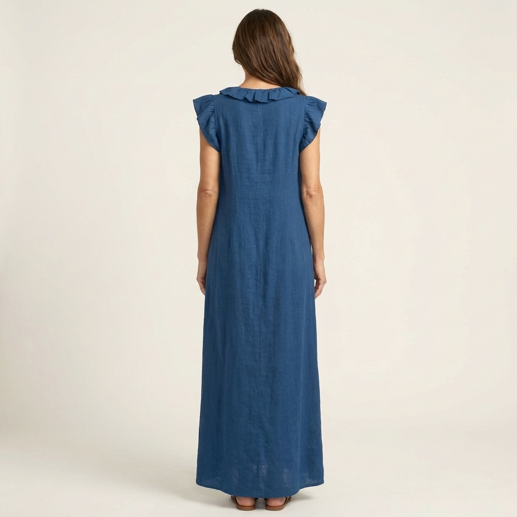 Artemis maxi dress in a vibrant red, captured in motion to show the natural drape and movement of the fabric.