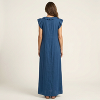 Artemis maxi dress in a vibrant red, captured in motion to show the natural drape and movement of the fabric.