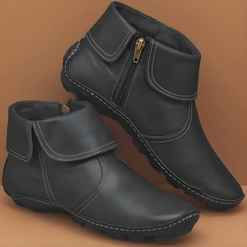 Angled shot of the sole and heel of the Audra orthopaedic waterproof boots, illustrating the sturdy grip and ergonomic design.