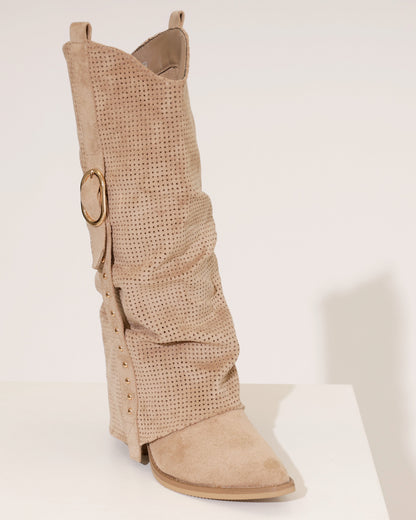 Side profile of a taupe cowboy boot, highlighting the intricate perforations and stacked block heel.