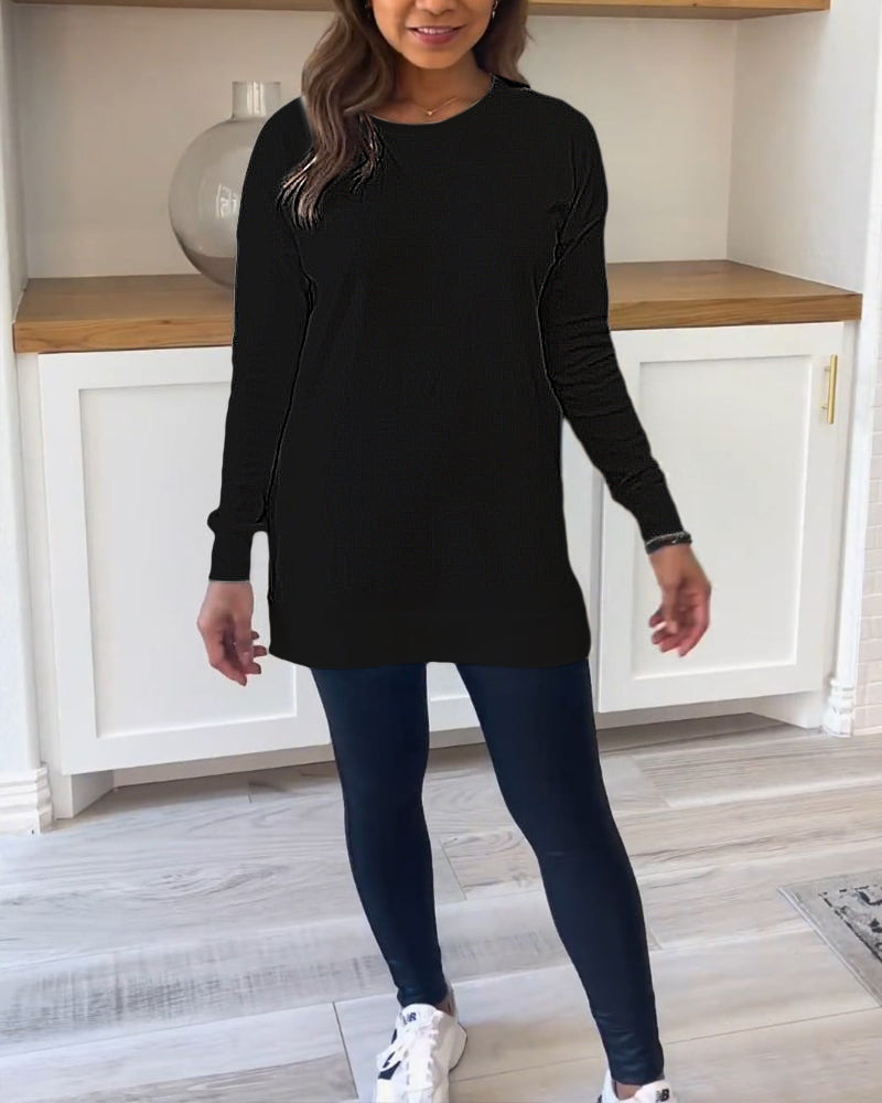 Flat lay of the pink Aurelia long sleeve top, neatly folded to show the solid colour and soft material.
