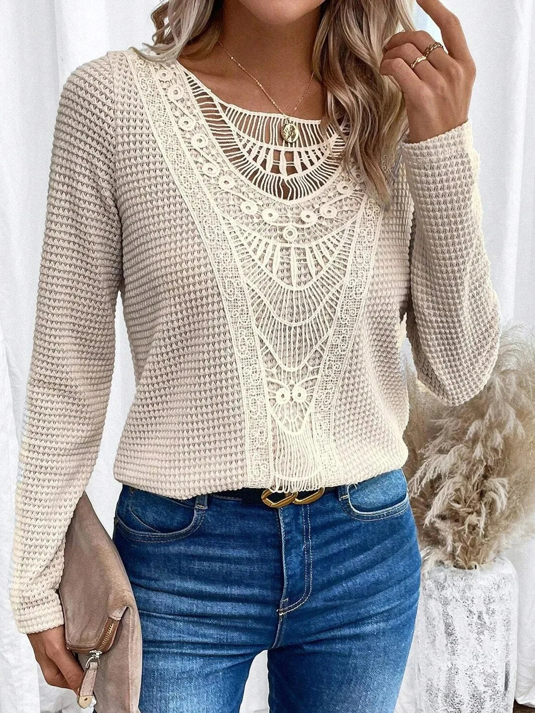Front view of a white Briar crochet detail jumper, showcasing the intricate texture and round neckline.