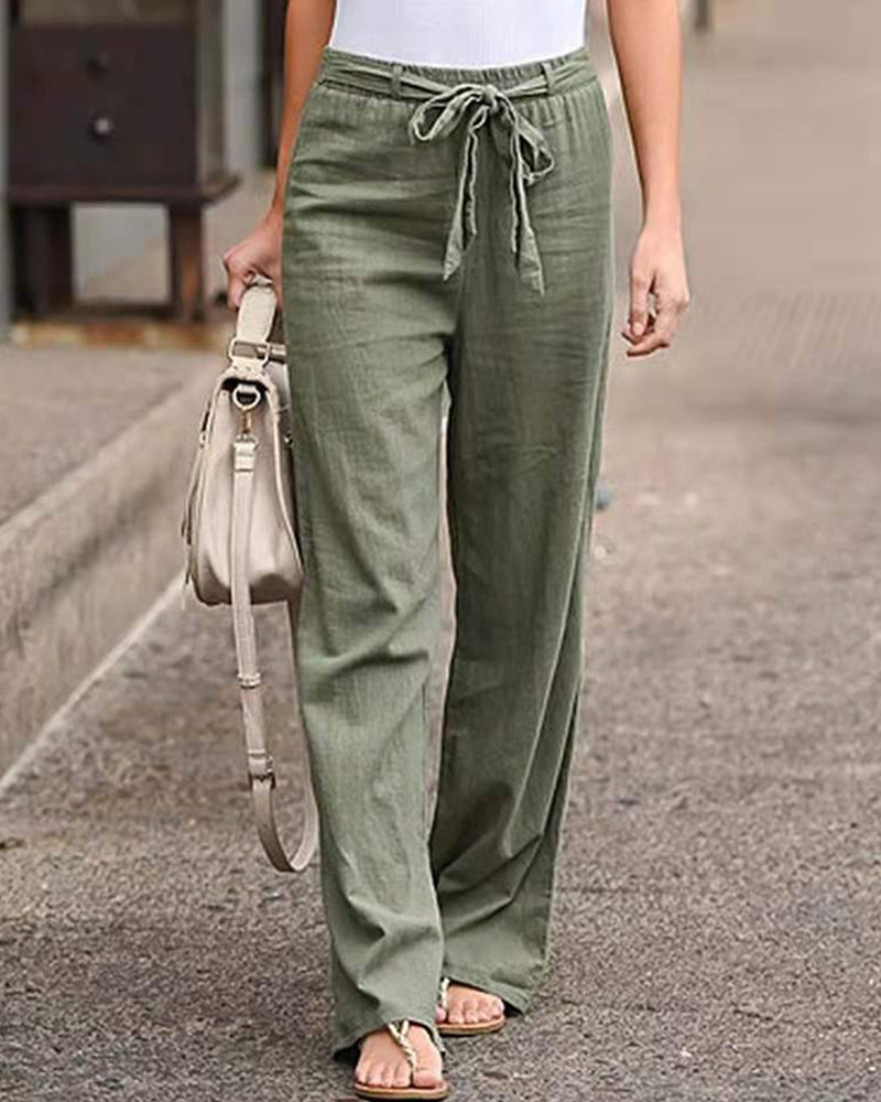 Front view of Calla relaxed straight-leg trousers in a beige colour, showcasing the airy cotton-linen fabric.