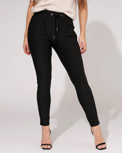 Front view of the black comfort skinny trousers, showcasing the sleek design and fabric texture.