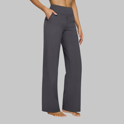 A woman walking, illustrating the freedom of movement provided by the Clara comfortable stretch trouser.