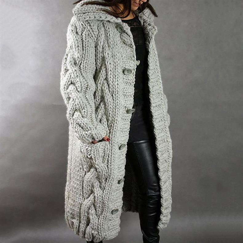 Lifestyle shot of the woman walking, showing the versatile movement and comfort of the Clara longline coat.
