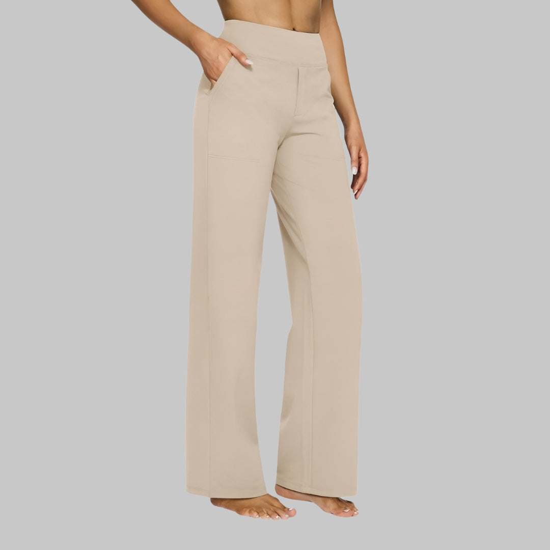 Detailed shot of the high-rise elastic waistband on the taupe Clara comfortable stretch trouser.