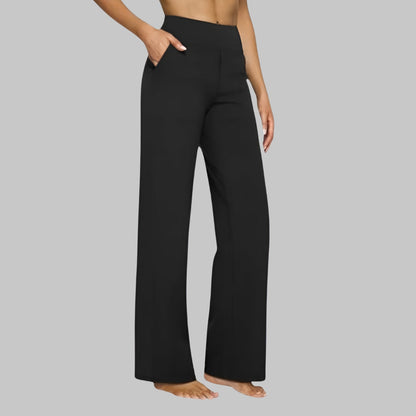 A woman pairing the taupe Clara comfortable stretch trouser with a casual top, suitable for daily wear.