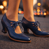 Side profile of the white leather heels, demonstrating the graceful curve of the lace-up closure and mid-height heel.