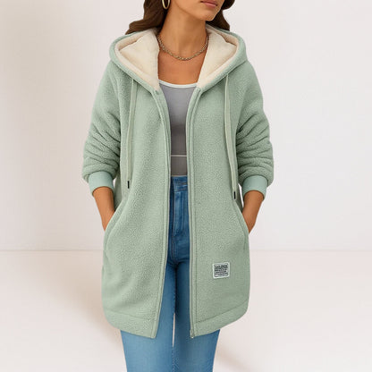 Close-up detail of the soft texture and zip closure on the women's fleece jacket.