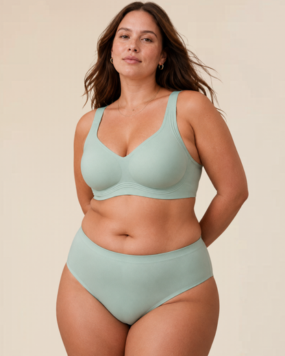 The Evanthe comfort wireless bra in a vibrant red, displayed on a mannequin to show its form.
