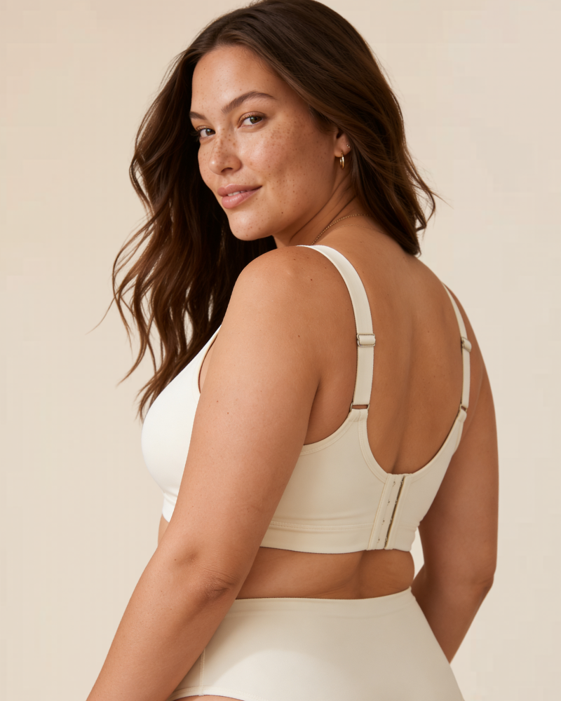 Overhead shot of the black comfort wireless bra laid flat, emphasising its sleek, unpadded design.