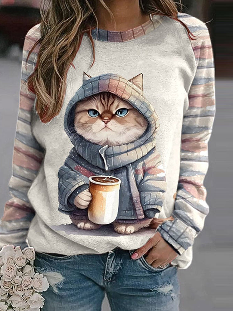 Front view of the Fiona cat print sweatshirt in pink, showcasing the full design and comfortable fit.