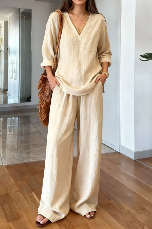 Side profile of a model wearing the green Genevieve linen blend co-ord set, highlighting its relaxed and comfortable fit.