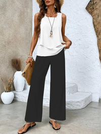 Side profile of a model wearing the comfortable Anya two-piece set, highlighting the flow of the printed trousers.