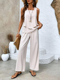 Detail shot of the round neckline and sleeveless design of the top from the Anya women's two-piece set.