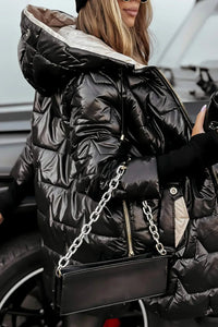 A collection of Inez hooded winter jackets in various colours, showcasing the range.