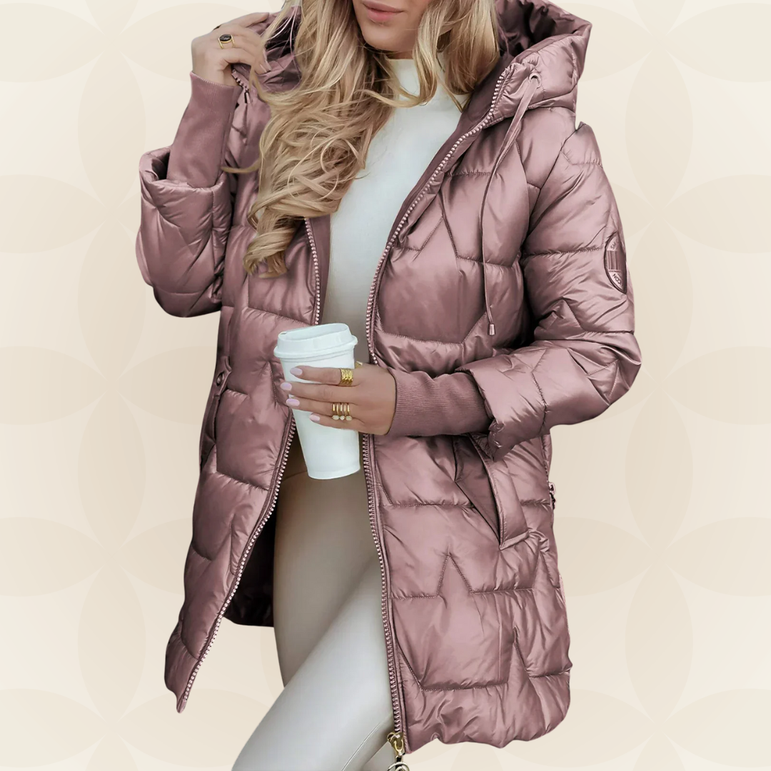 A pink Inez hooded winter jacket styled casually, perfect for a crisp autumn day.