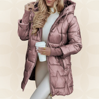A pink Inez hooded winter jacket styled casually, perfect for a crisp autumn day.