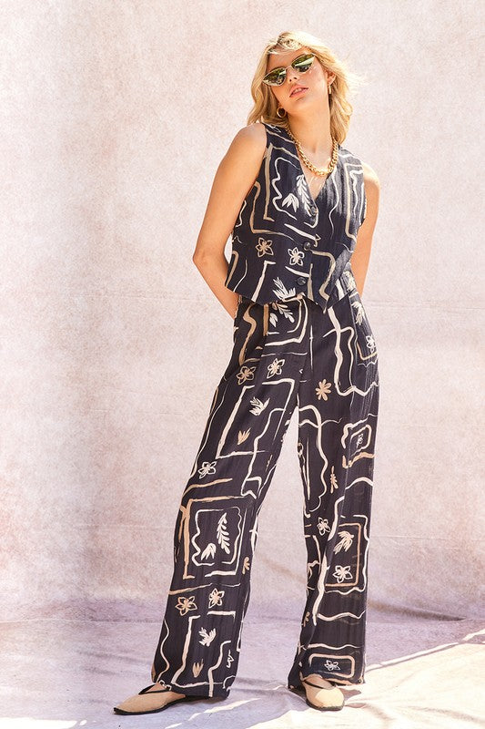 Overhead flat lay of the patterned wide-leg trousers, highlighting the design.