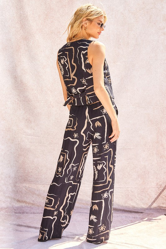 Rear view of the wide-leg trousers, showing the flow and fit from behind.