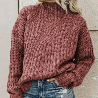 Side profile of a woman wearing the Anya elegant knitted jumper in black, demonstrating the flattering, comfortable fit.