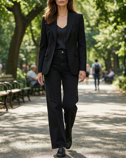Side profile of the black Juniper straight leg jeans, illustrating the sleek, versatile look for various occasions.